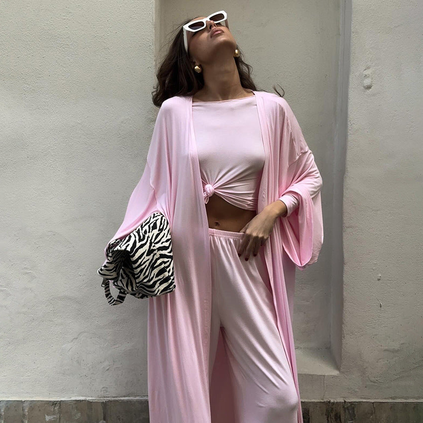 Three-piece summer pajamas set by Bella Mia with a knitted solid color top and loose trousers for comfortable home wear.