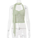 Women’s summer lace halterneck vest top by Bella Mia featuring see-through fabric and decorative ribbon details.