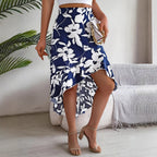Women’s floral ruffled asymmetrical mid-length skirt by Wanita Store, perfect for spring and summer, with elegant floral design.
