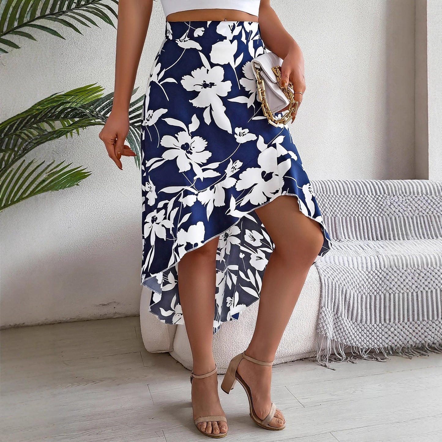 Women’s floral ruffled asymmetrical mid-length skirt by Plush Fashion Hub, perfect for spring and summer, with a flowing, elegant design.