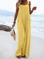 Women’s summer jumpsuit by Bella Mia, ethnic style with solid color and wide-leg design, shown in navy fabric.