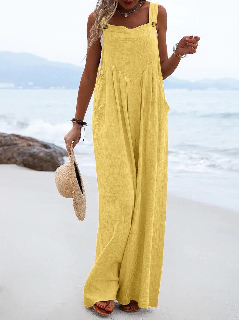 Women’s summer jumpsuit by Bella Mia, ethnic style with solid color and wide-leg design, shown in navy fabric.
