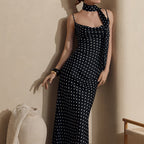 Polka dot strap maxi dress by Plush Fashion Hub featuring halter straps and a fishtail silhouette for summer wear
