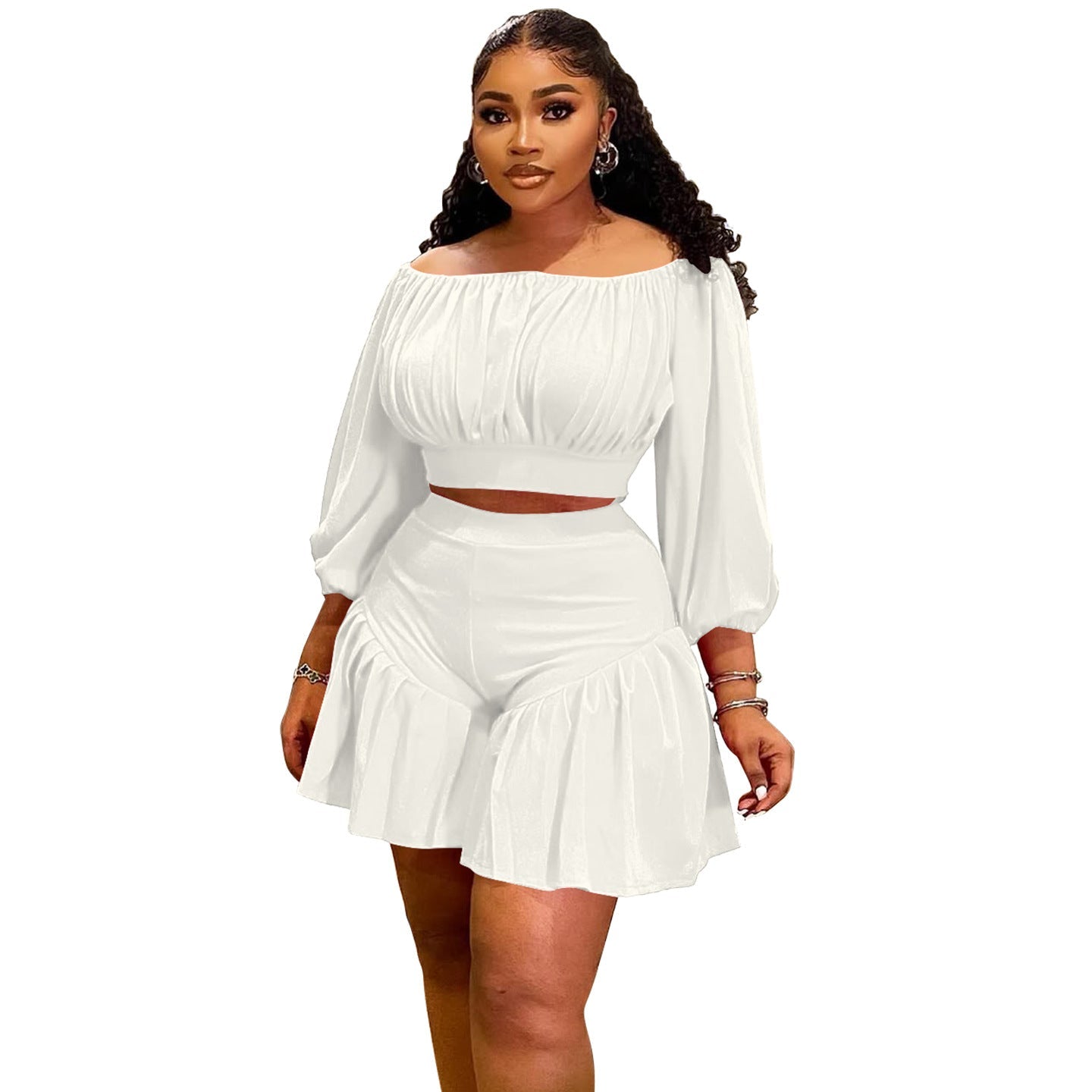 Plus size women's two-piece set by Wanita Store with pleated off-shoulder top and fluffy waist-trimming pants, casual style.