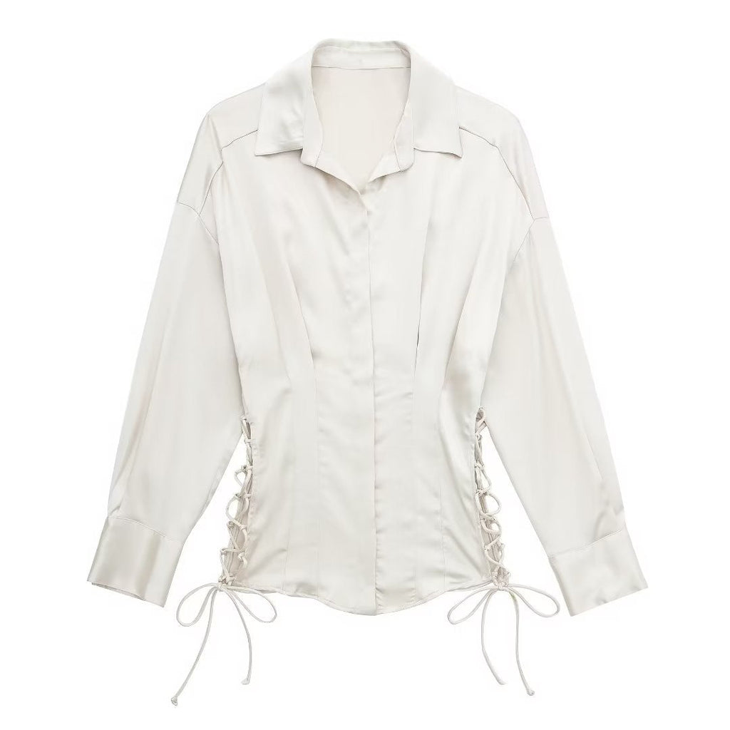 Autumn women’s slim fit satin shirt with long sleeves and lace-up front by Bella Mia, shown in a stylish, close-up view.