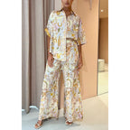 Women’s casual spring summer two-piece set with pocketed half sleeves and loose fit, featuring a comfortable and stylish design.