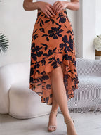 Elegant floral ruffled mid-length asymmetric skirt for women, perfect for spring and summer, by Wanita Store.