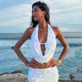 Women’s solid color sequined bikini swimsuit and sun-proof skirt set by Plush Fashion Hub, perfect for beachwear and summer sun.