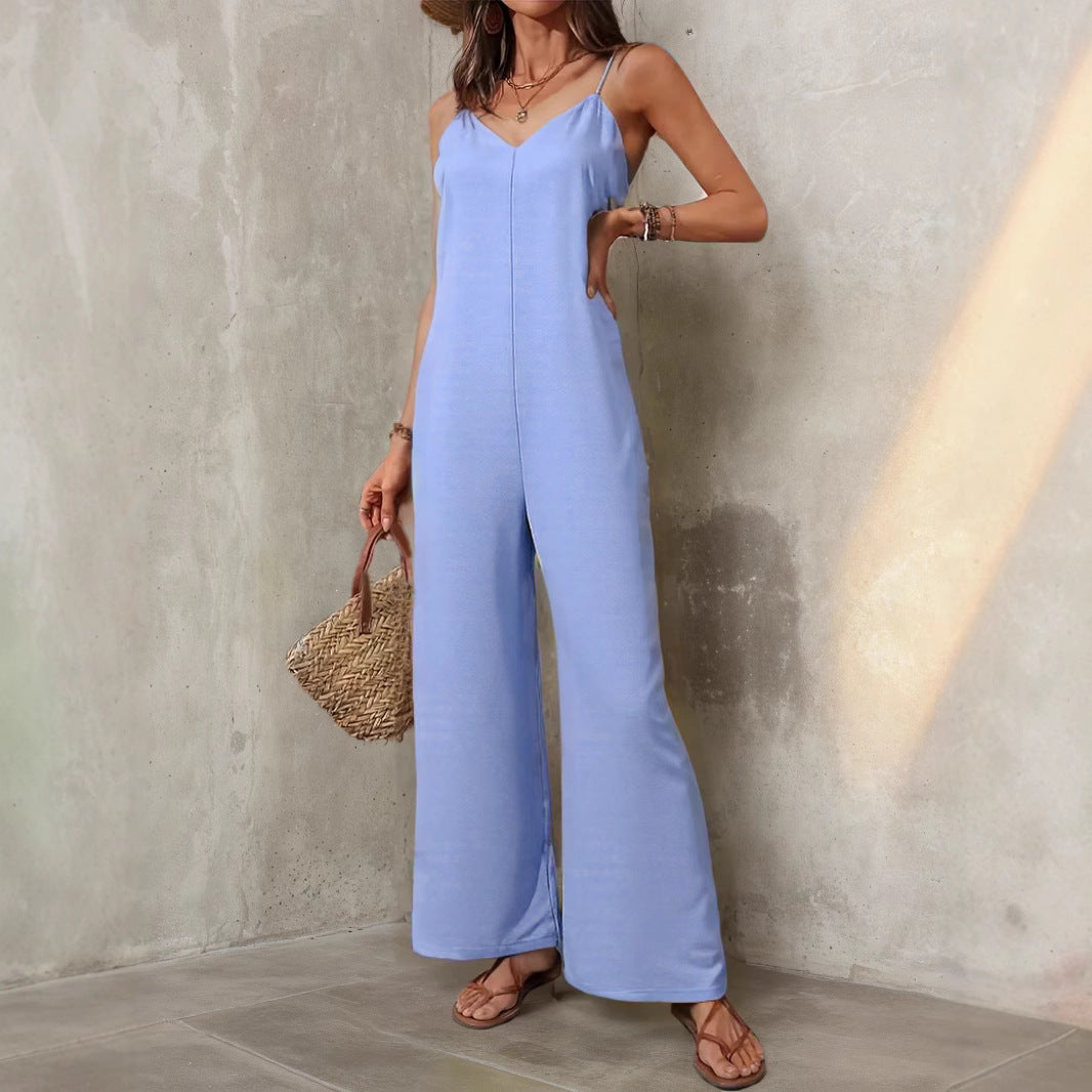 Women’s solid color sleeveless sling jumpsuit with loose wide-leg pants, casual style, by Plush Fashion Hub.