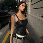 Women’s summer crop vest by Bella Mia featuring a solid color coated fabric, shoulder straps, and a sexy U collar.