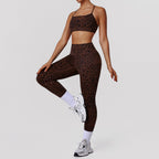 Leopard print high waist yoga pants and matching fitness bra set by Bella Mia, designed for exercise and active wear.