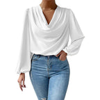 Loose draped V-neck long-sleeved shirt for women by Bella Mia, shown in a relaxed fit with soft fabric and stylish design.