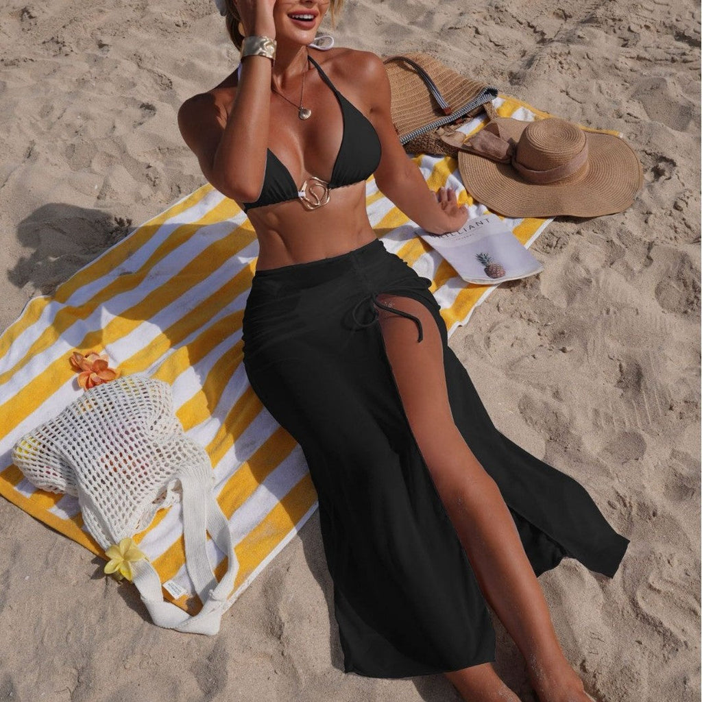 Solid color beach sun protection tulle skirt and bikini three-piece swimsuit set by Plush Fashion Hub displayed on a model.