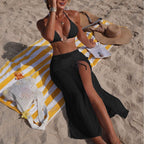 Solid color beach sun protection tulle skirt and bikini three-piece swimsuit set by Plush Fashion Hub displayed on a model.