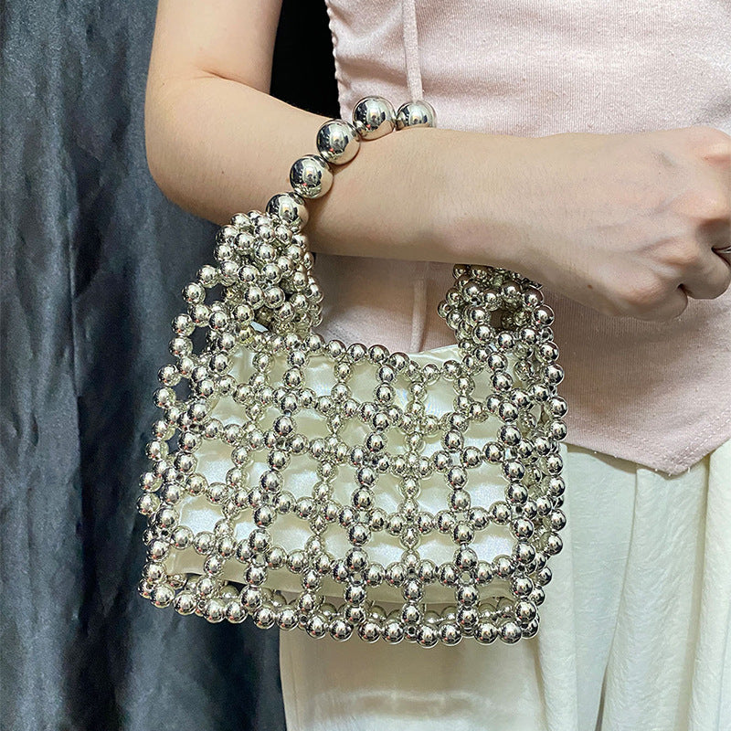 High Sense Minority Simple Elegant Hollow Out Cutout Handmade Beaded Dumpling Bag Retro Woven Handbag Bella Mia