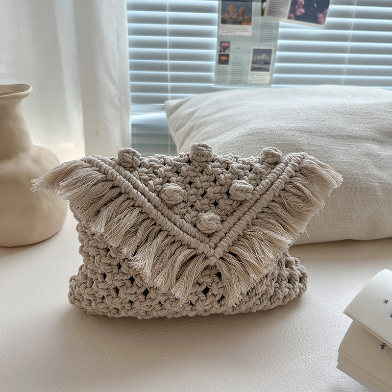 Bella Mia woven cotton beanie crossbody bag with tassel details, shoulder strap, perfect for beach or vacation use.