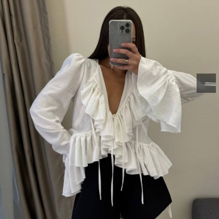 Women’s spring ruffled flare sleeve tie neck top by Bella Mia, featuring a matching shirt with feminine ruffle details.