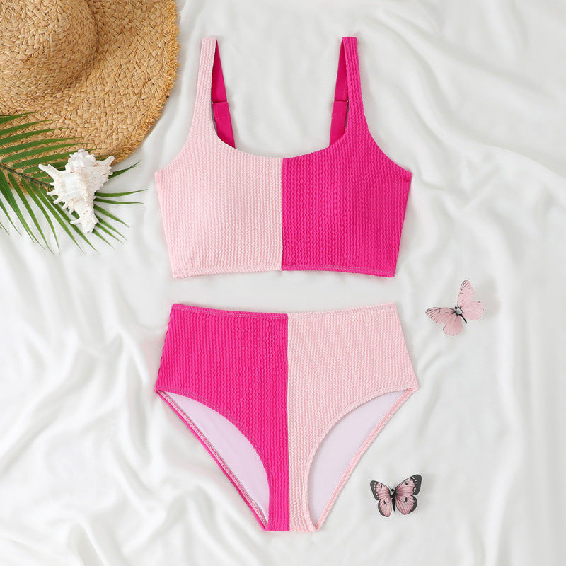 Women’s solid color high waist bikini from Bella Mia, featuring a stylish split design and sexy swimwear look.