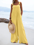 Women’s summer jumpsuit by Bella Mia featuring a solid color, ethnic print, and wide-leg design, perfect for warm weather.