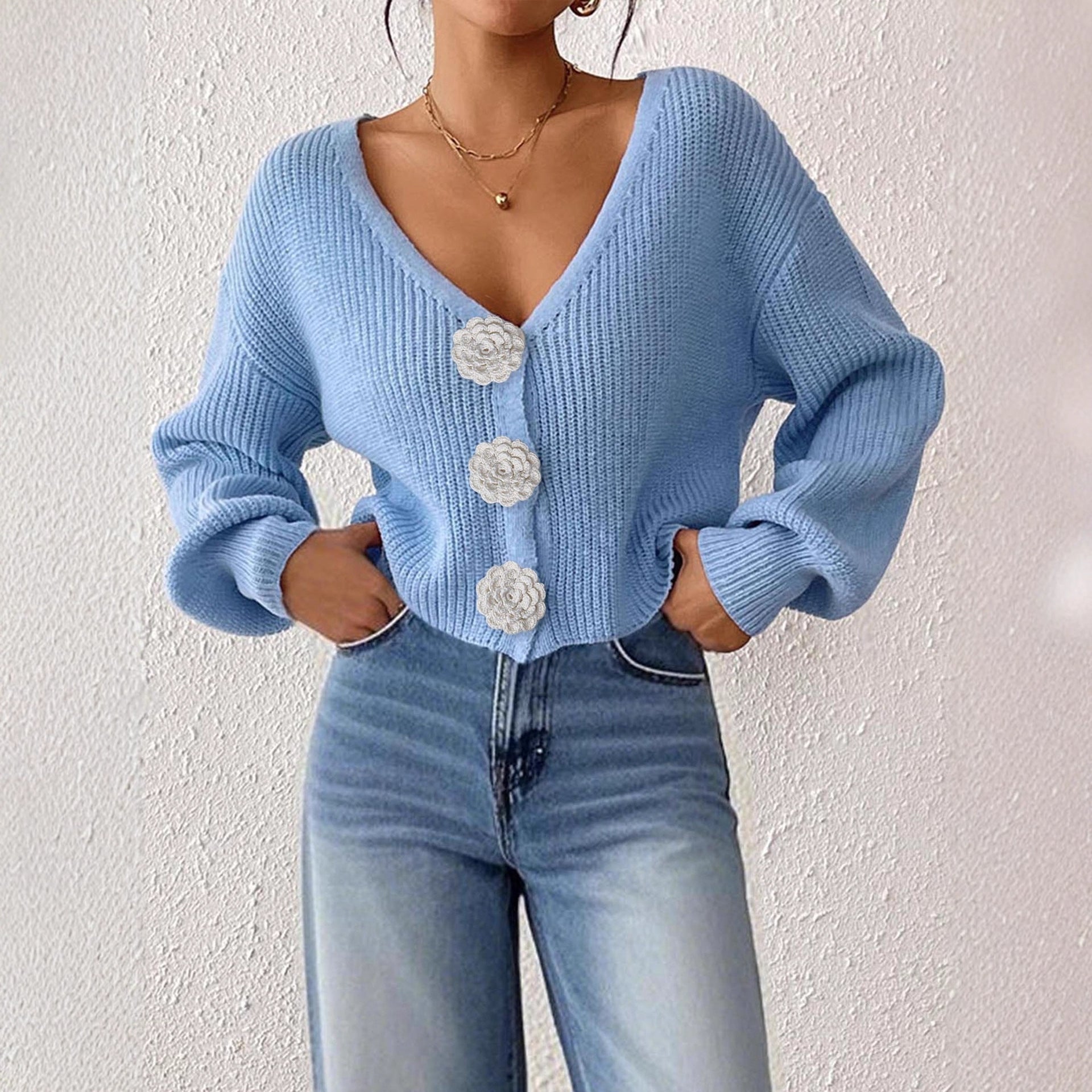 Women’s knitted floral cardigan by Bella Mia featuring decorative buttons, short length, and street hipster style.