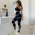 Bella Mia high top sports yoga pants with tie-dye design, moisture-wicking, quick-dry fabric, and ankle-length fit for active wear.