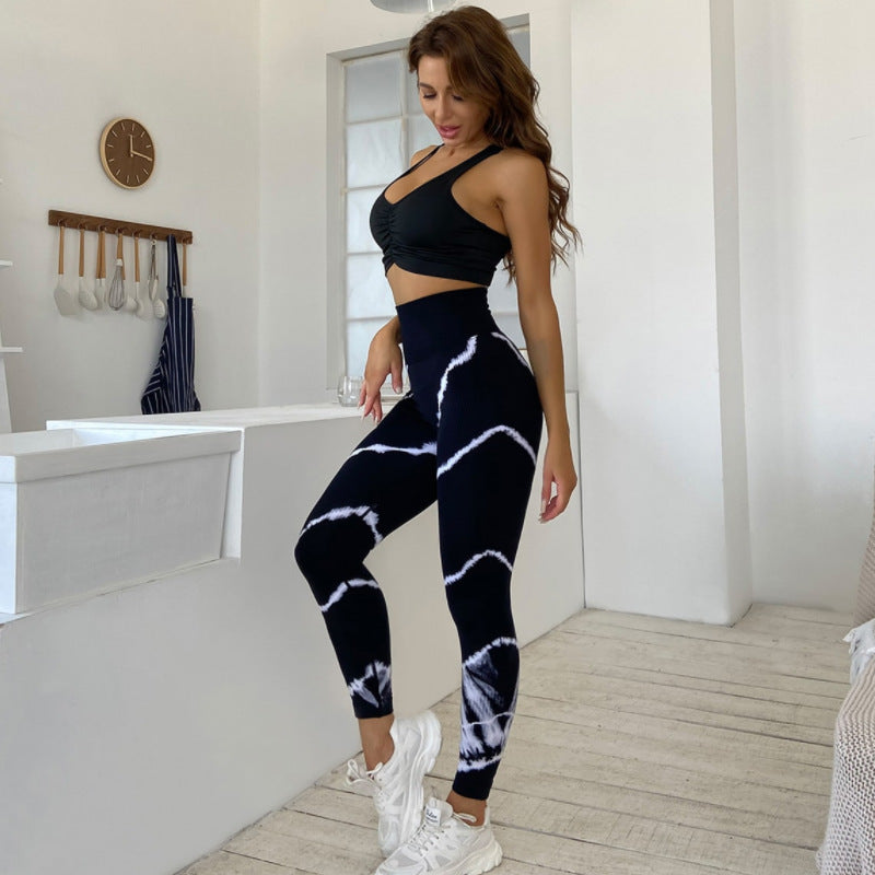 Bella Mia high top sports yoga pants with tie-dye design, moisture-wicking, quick-dry fabric, and ankle-length fit for active wear.