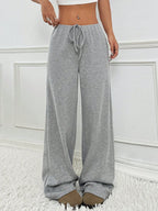 Casual women's striped solid color rubber band drawstring straight-leg pants, ideal for autumn and winter wear.