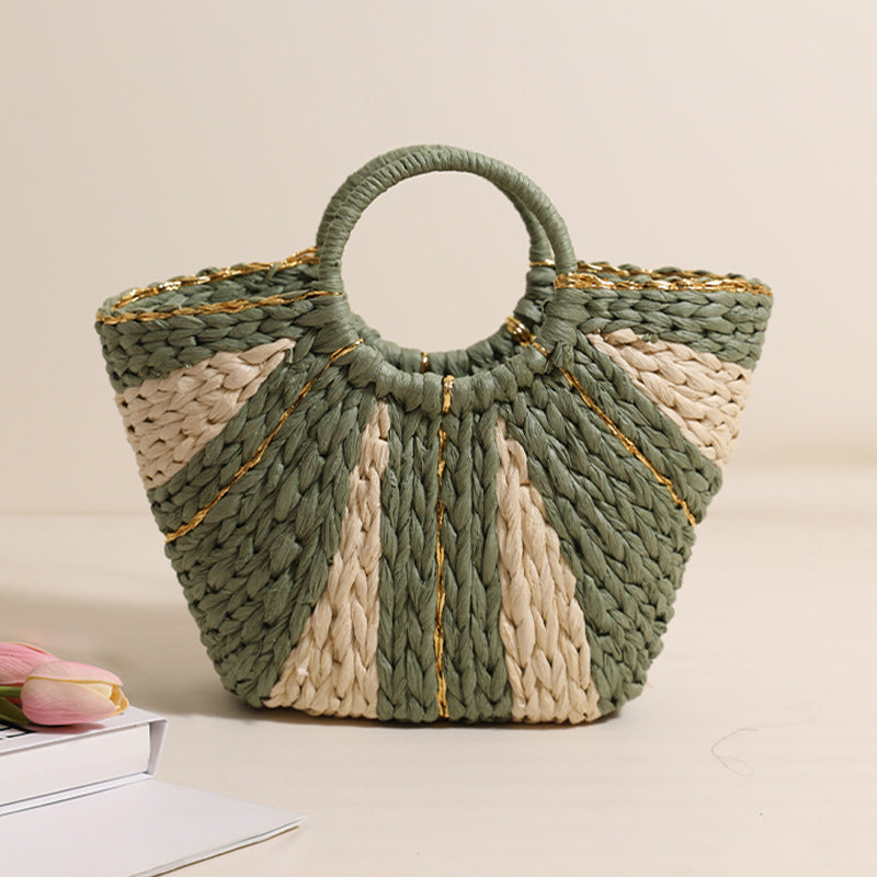 Bella Mia large straw-weaved tote bag with contrast handles, perfect for beach, vacation, or vegetable shopping.