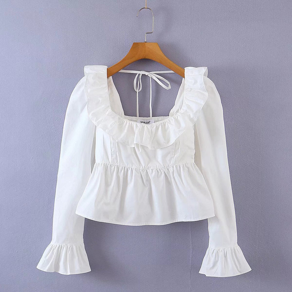 Bella Mia Summer Wind solid color long sleeve ruffled shirt for women, featuring a stylish and elegant design with ruffle details.