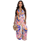 Women’s sleeveless lace-up wide-leg printed jumpsuit by Bella Mia, featuring a stylish pattern and comfortable fit.