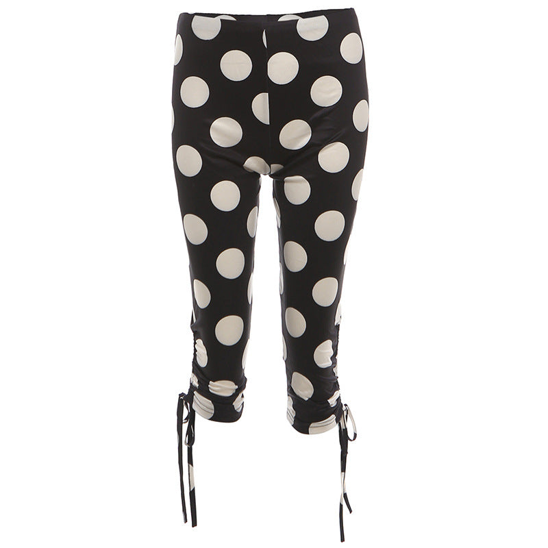 Sexy women’s cropped pants with irregular asymmetric polka dot print, casual fit, from Wanita Store.