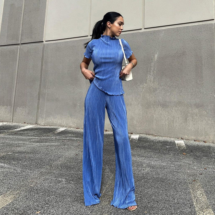 Blue high-waist pleated wide-leg pants and a spring slimming t-shirt, casual women's fashion outfit from Wanita Store.