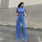 Blue high-waist pleated wide-leg pants and a spring slimming t-shirt, casual women's fashion outfit from Wanita Store.