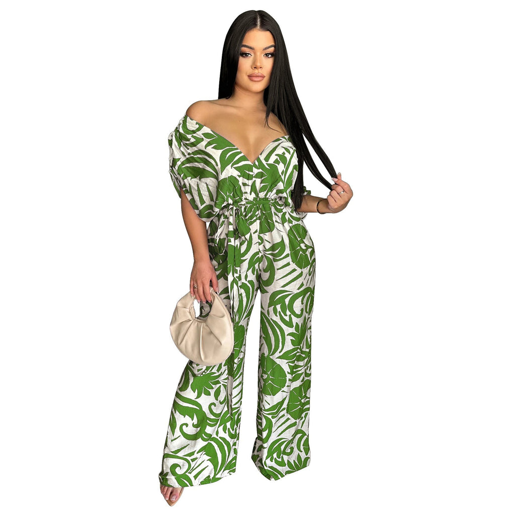 Women’s off-shoulder batwing sleeve wide-leg printed jumpsuit by Bella Mia, featuring a stylish, flowy design and vibrant print.