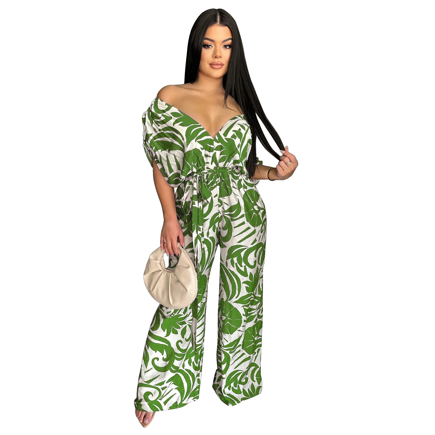 Women’s off-shoulder batwing sleeve wide-leg printed jumpsuit by Bella Mia, featuring a stylish, flowy design and vibrant print.