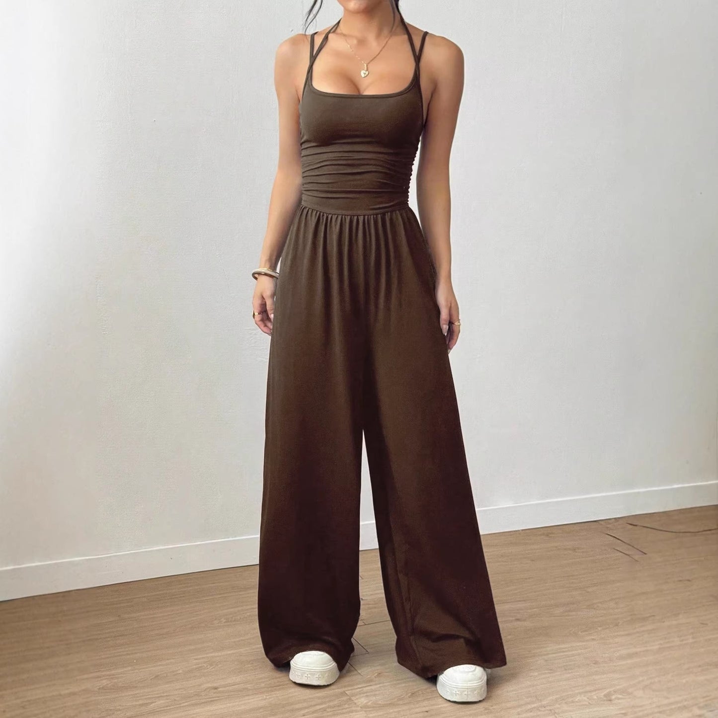 Women’s casual summer jumpsuit with wide leg, wrapped chest, nipped waist, and suspenders from Plush Fashion Hub.