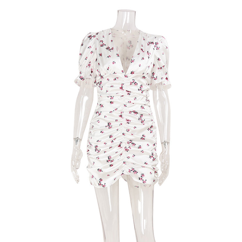 Women’s floral puff sleeve dress with V-neck, slim fit, and short length by Bella Mia, featuring a sexy and stylish design.
