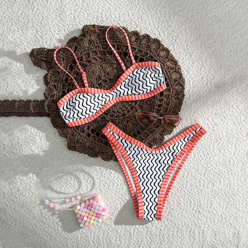 Printed strap bikini two-piece set by Bella Mia featuring colorful seaside-themed design, perfect for spring beachwear.