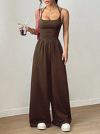 Women’s summer wide-leg jumpsuit with suspenders, wrapped chest, nipped waist, casual loose fit, by Plush Fashion Hub