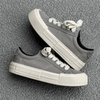 Women’s canvas platform skate shoes by FitiqueFit, casual and sporty sneakers with a lifted sole and stylish design.