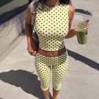Polka dot sleeveless backless top with slim cropped pants two-piece set for women by Bella Mia, perfect for summer fashion.
