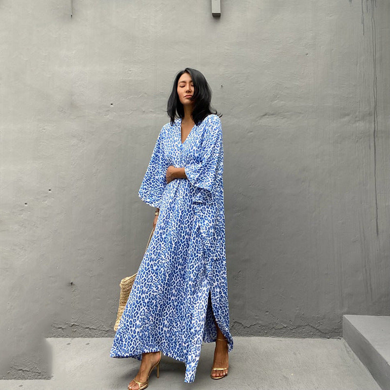 Plush Fashion Hub printed long beach cover-up skirt with sun protection, worn over bikini, suitable for vacation and beachwear.
