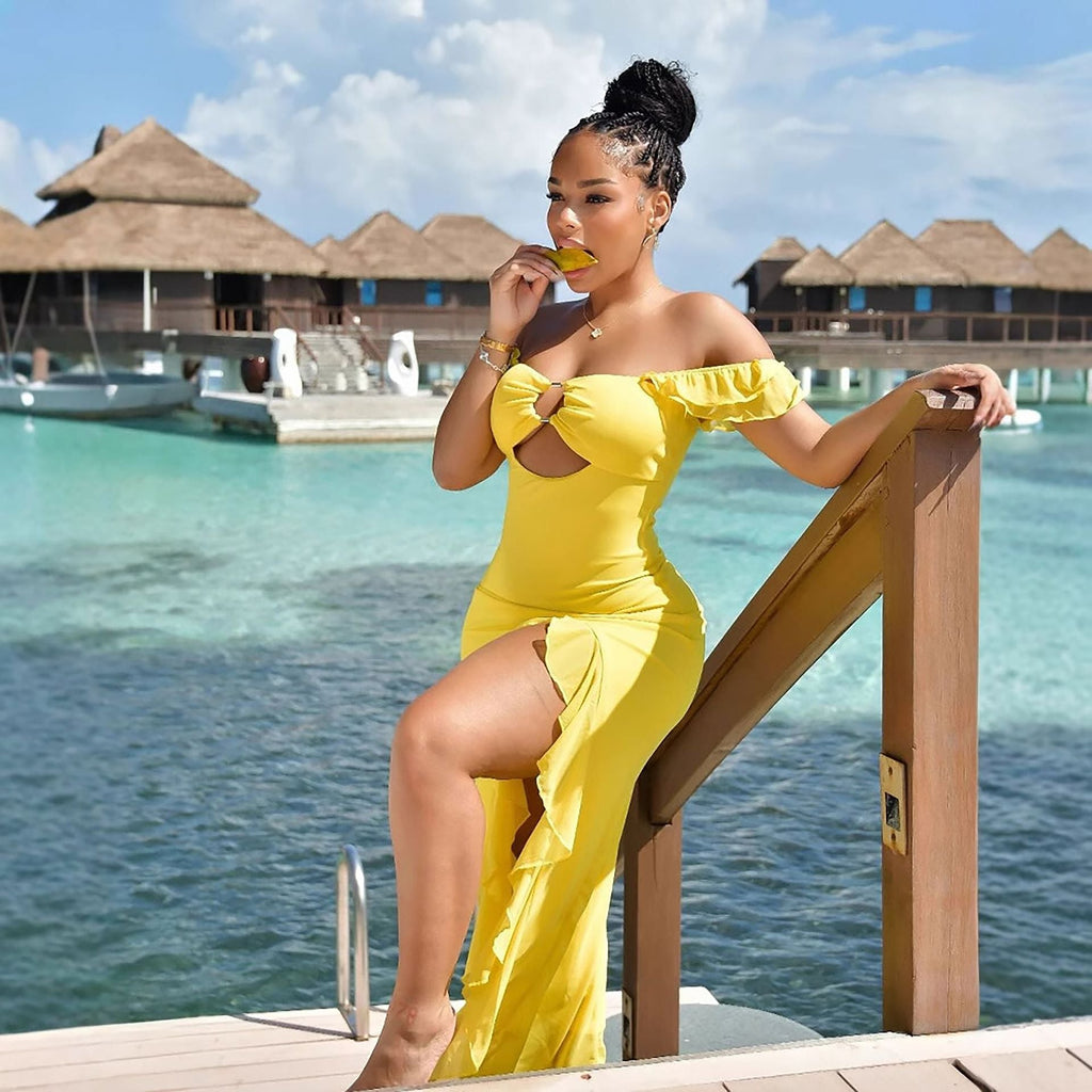Summer women's off-shoulder tube top dress by Wanita Store featuring a hollow-out cutout, slim fit, and slit design.