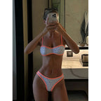 Printed strap bikini two-piece swimsuit for women by Bella Mia, featuring a stylish design perfect for beach and seaside wear.