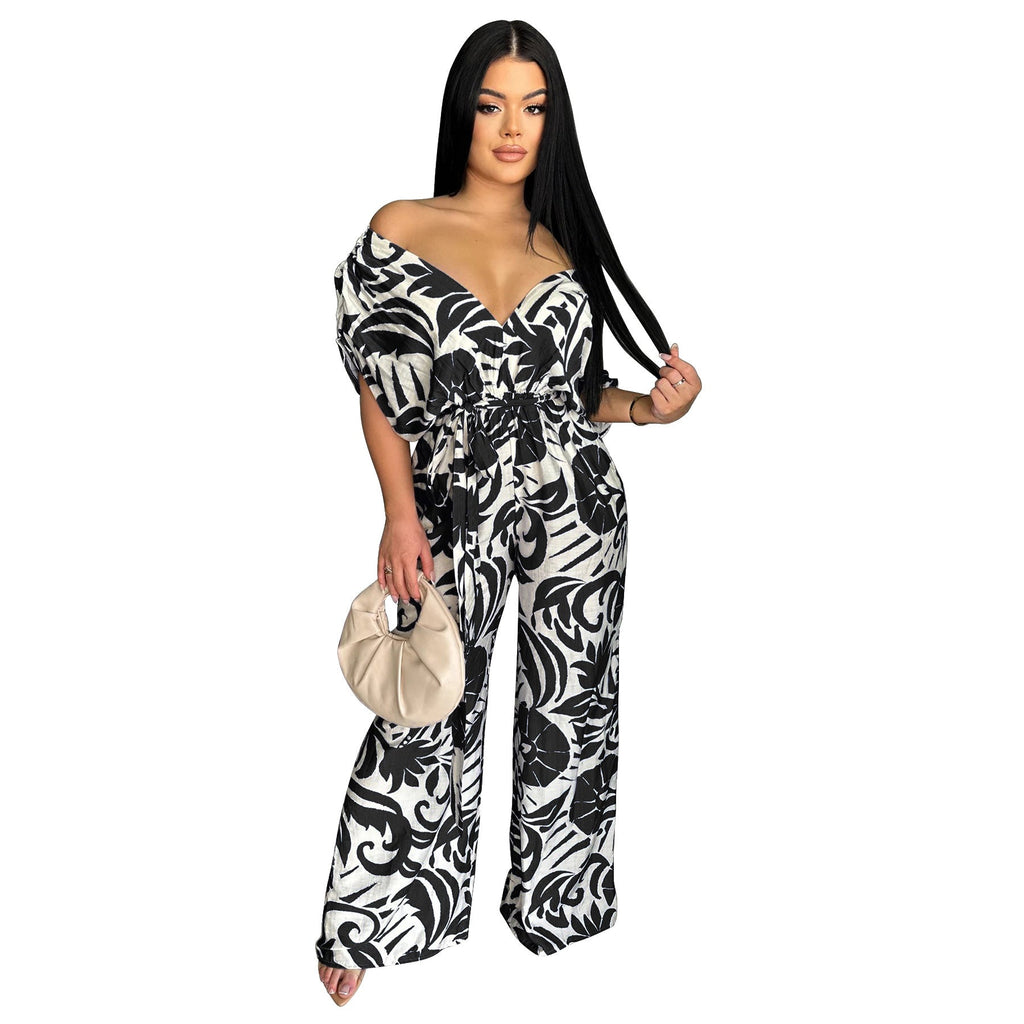 Women’s printed off-shoulder batwing sleeve wide-leg jumpsuit by Bella Mia, featuring a stylish and comfortable design.