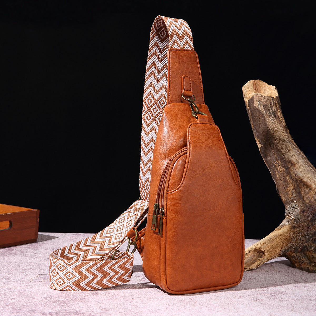 Ladies Wanita Store casual crossbody chest bag in solid color with vintage bohemian style, worn as a waist or shoulder bag.