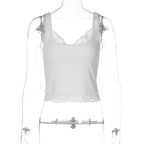 Bella Mia sexy lace short vest top for women in solid color, featuring a fitted design and lace details.