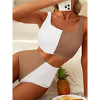 Women’s high waist bikini swimsuit by Bella Mia featuring a solid color and sexy split design for stylish beachwear.