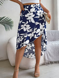 Women’s floral ruffled mid-length asymmetric skirt by Wanita Store, perfect for spring and summer, with elegant, irregular design.