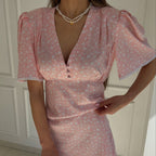 Women’s summer floral dress by Plush Fashion Hub, casual V-neck short sleeve dress with high waist and short length.